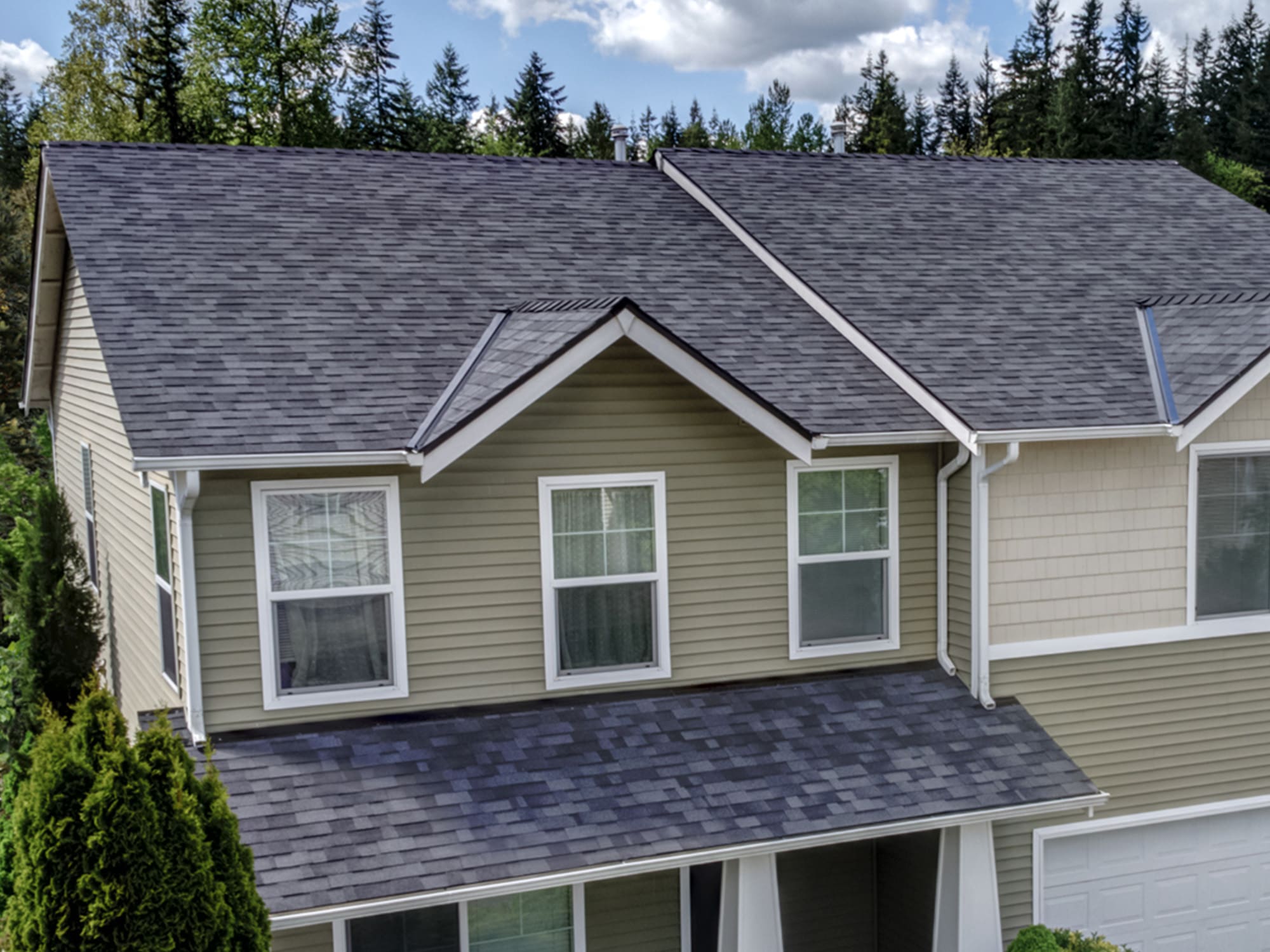 Home with Malarkey Roofing Products Midnight Black Vista Shingles.